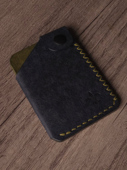 Le Patron handmade leather wallet crafted from Italian Pueblo leather. the colors are navy & olive.